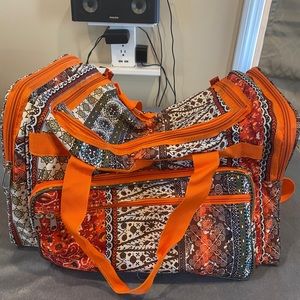Orange print weekend getaway bag